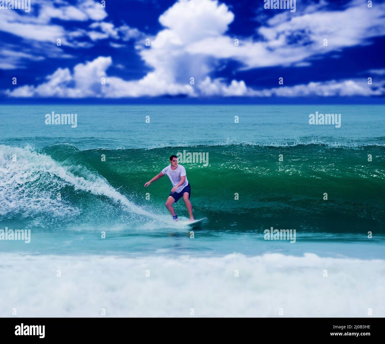 Surfer con scheda Foto Stock