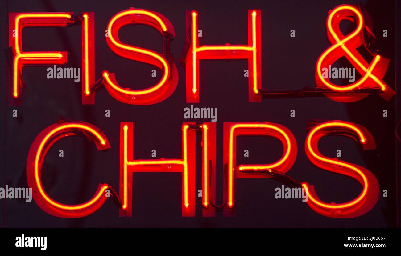 Cartello al neon del ristorante Fish and Chips Foto Stock