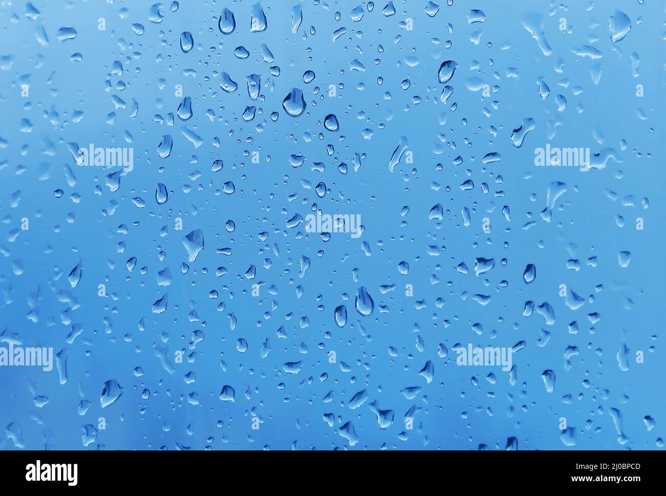 Gocce di acqua sul vetro Foto Stock