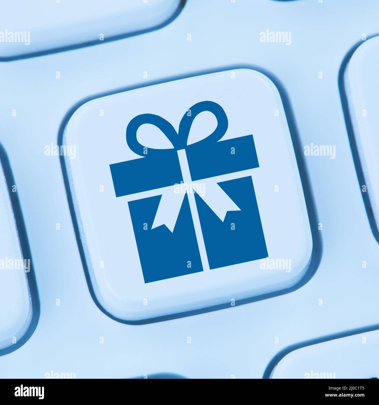 Regali regalo shopping online ordinare internet blu computer web Foto Stock