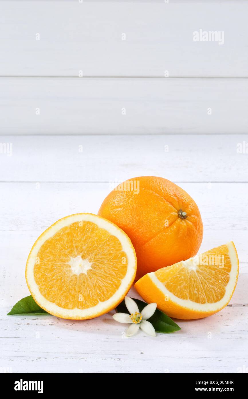 Arance frutta arancia frutta ritratto testo libero spazio legno asse Foto Stock