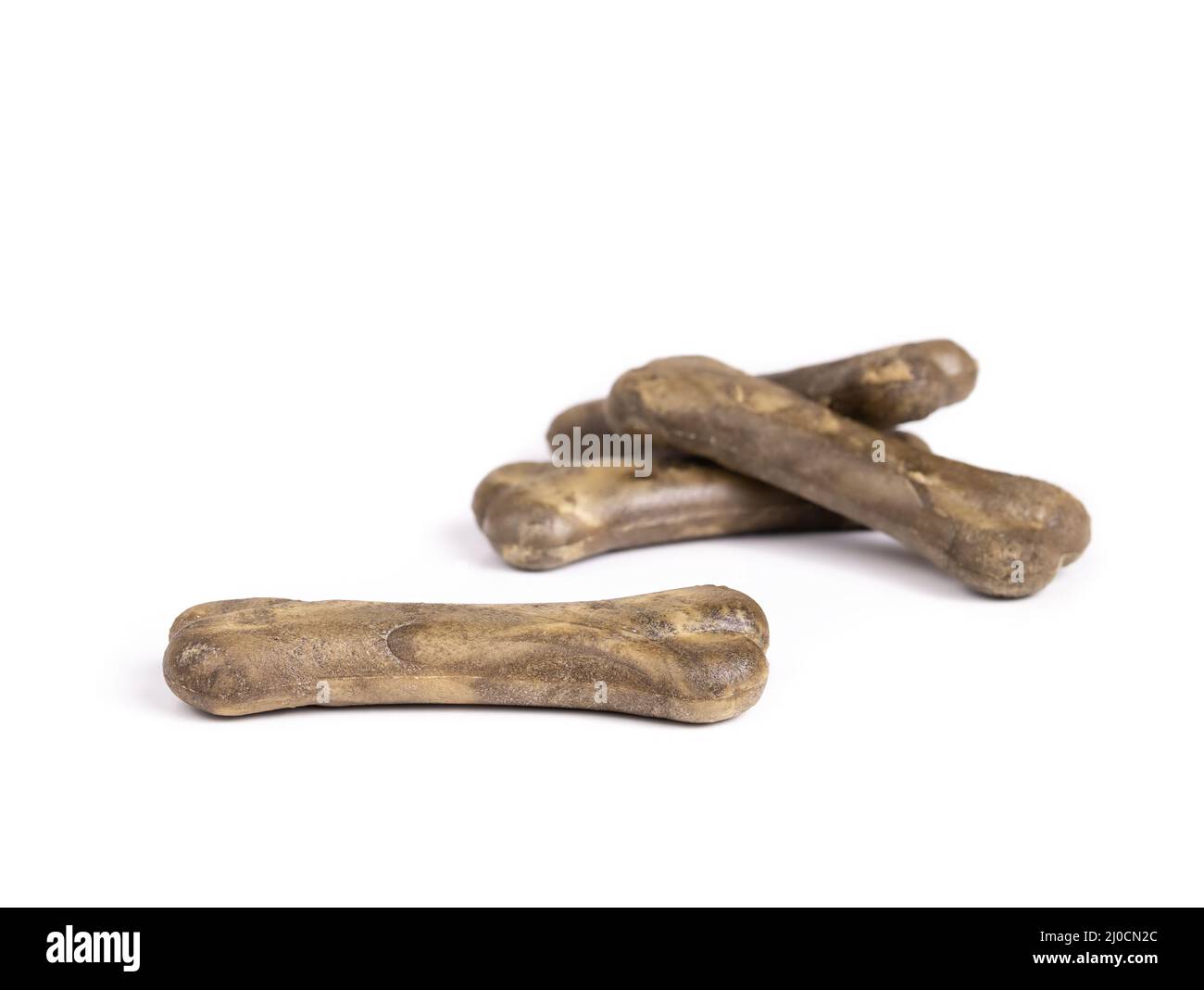 Cane grande masticare ossa per respiro fresco. Bastoni multipli per il trattamento del cane in forma ossea per denti forti, gengive migliori e respiro. Trattamenti dentali per la salute dei cani Foto Stock