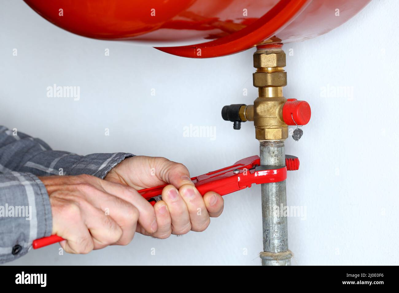 Operatore con chiave rossa Foto Stock