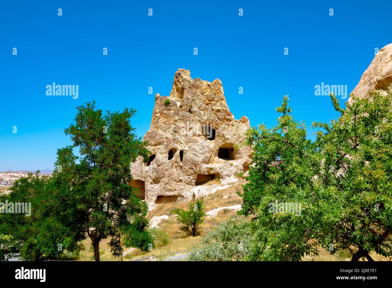 Fata Chimneys o Hoodoos in Goreme Open Air Museum in Cappadocia Turchia. Viaggio in Turchia foto di sfondo. Foto Stock