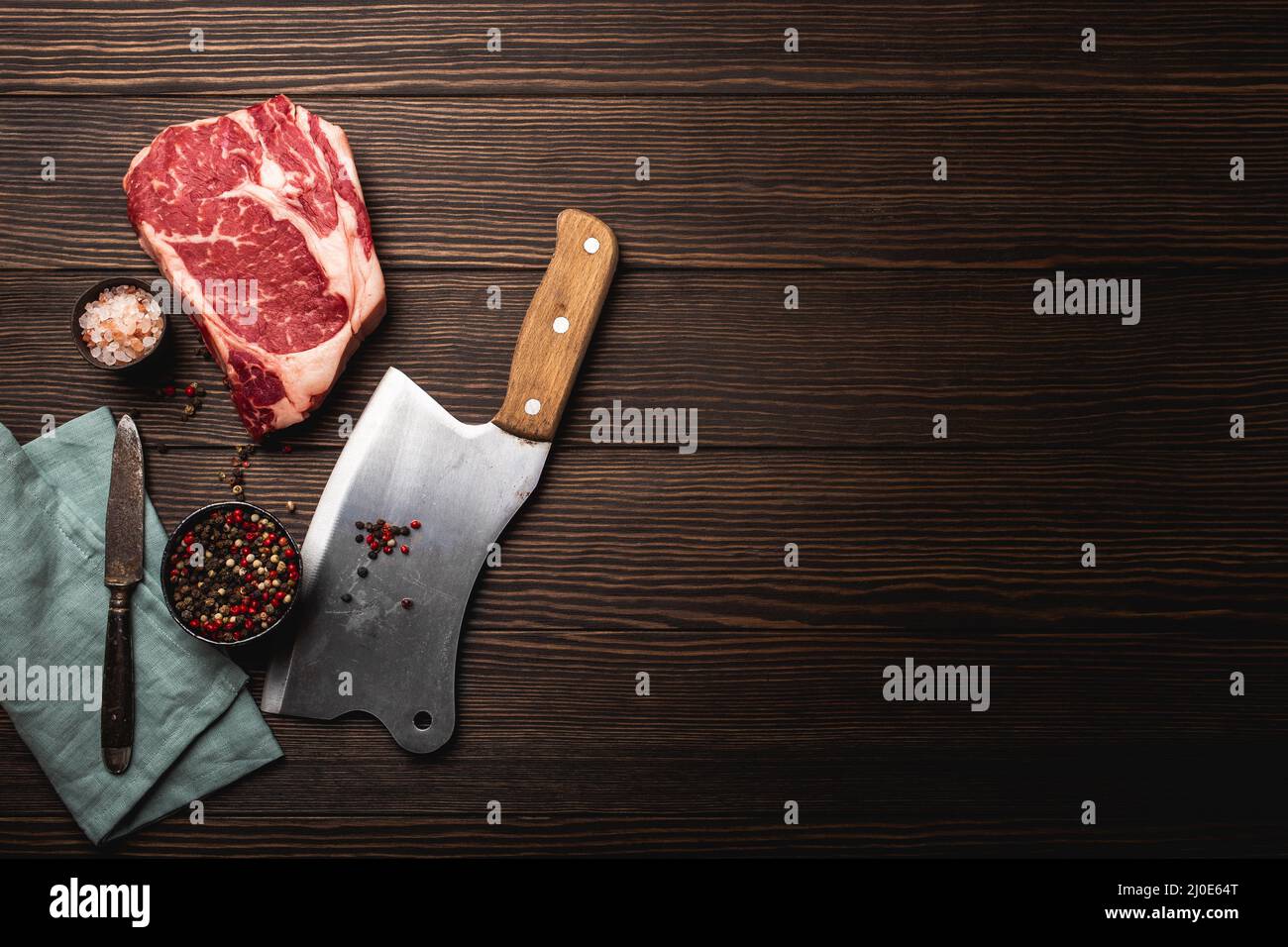 Bistecca di carne e cleaver Foto Stock