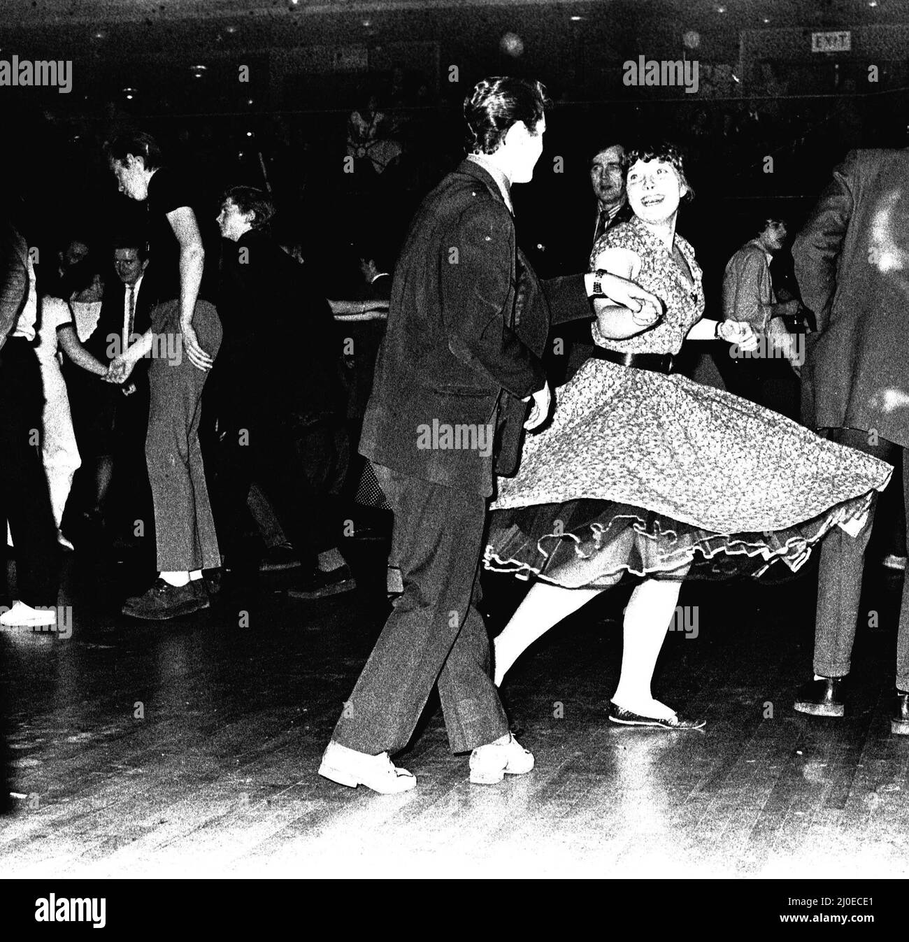 I ballerini Rock and Roll sbattono sulla pista da ballo in occasione di un concerto di Jerry Lee Lewis alla Mayfair Ballroom il 14th febbraio 1980 Foto Stock