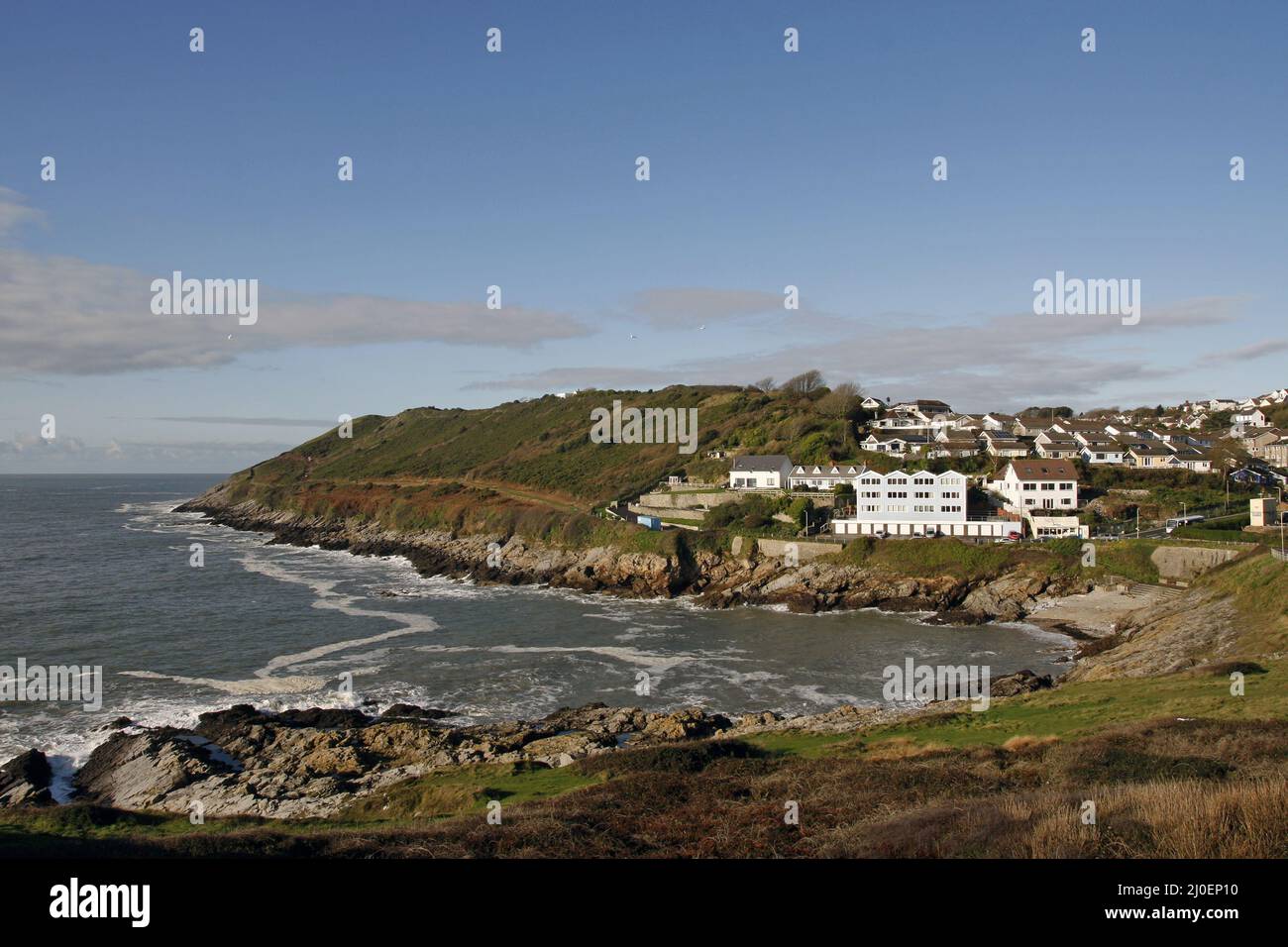 Baia di Limeslade in alta marea Foto Stock