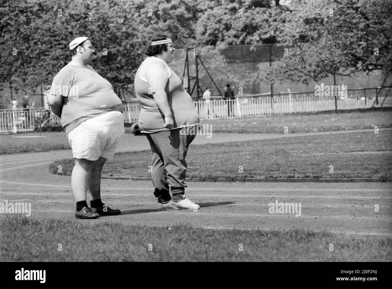 Jogger-nauts: John Robinson scrittore sportivo con Colin Taylor jogging a Battersea Park. Maggio 1979 78-2550-009 Foto Stock