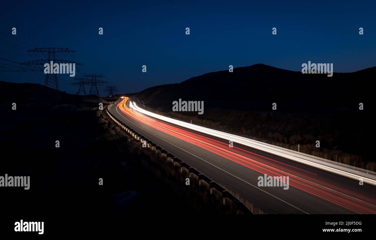 Percorsi leggeri da auto in rapido movimento Foto Stock