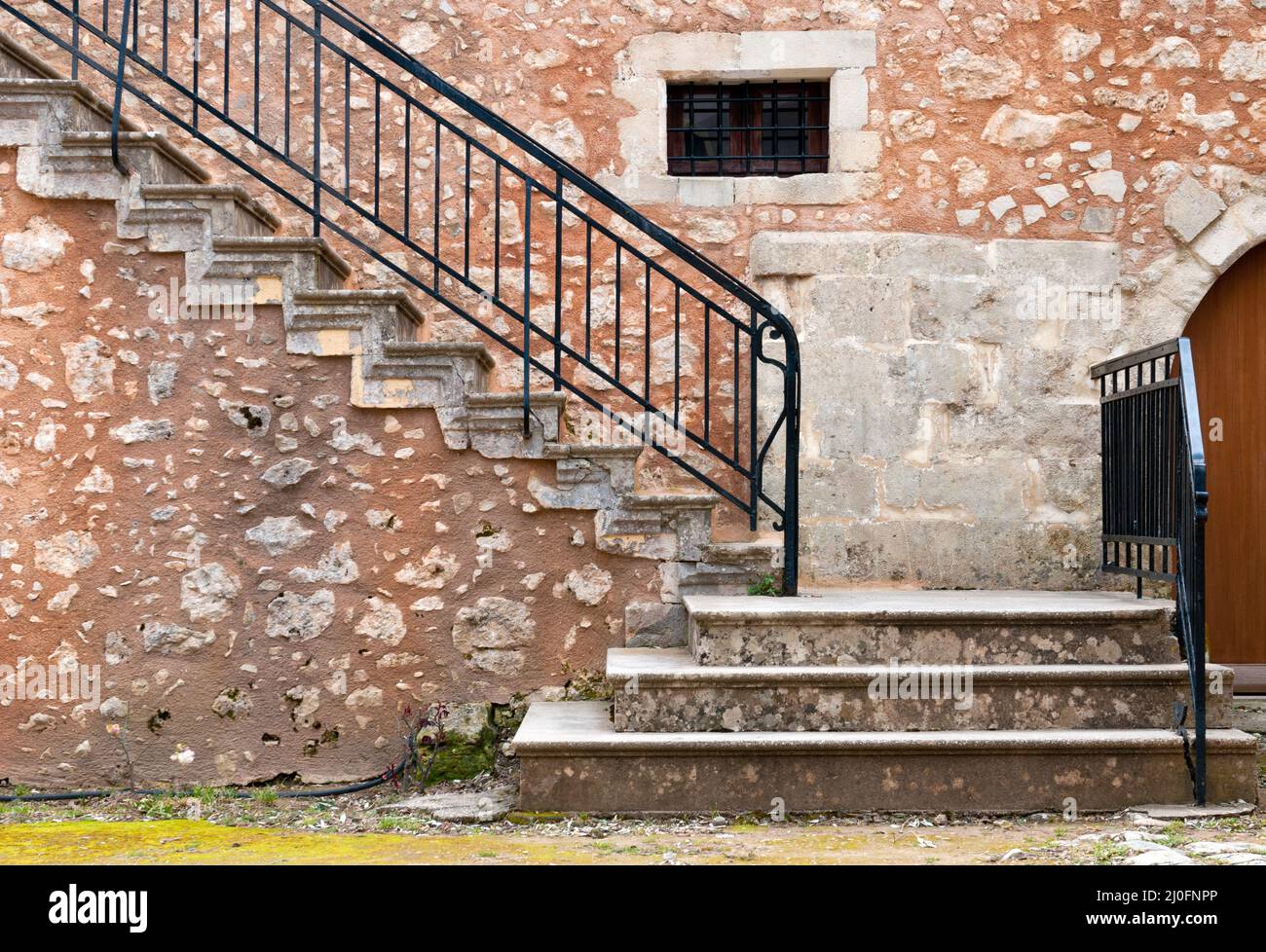 Scala metallica che conduce al tetto Foto Stock