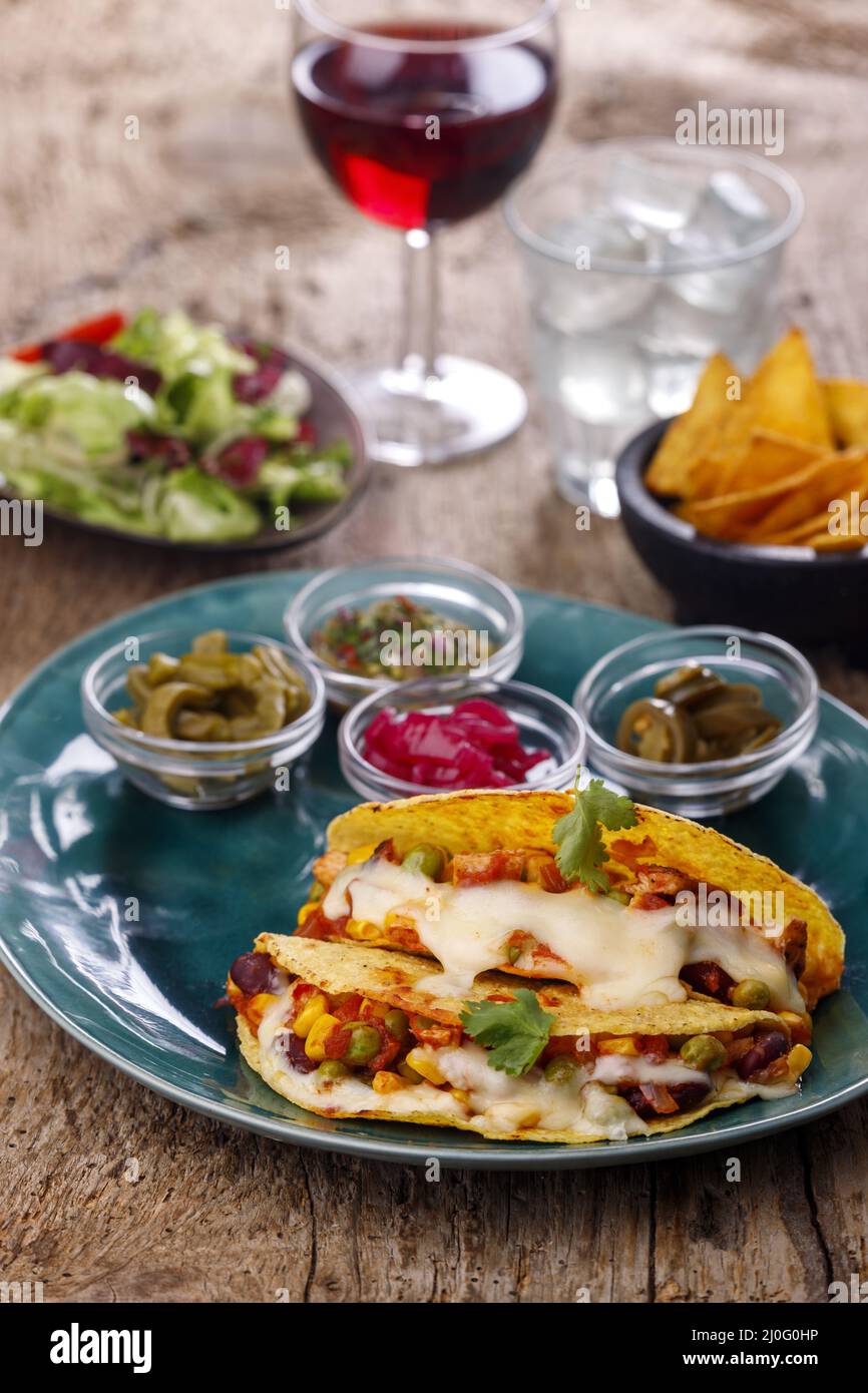 Tacos messicani gratinati con formaggio Foto Stock