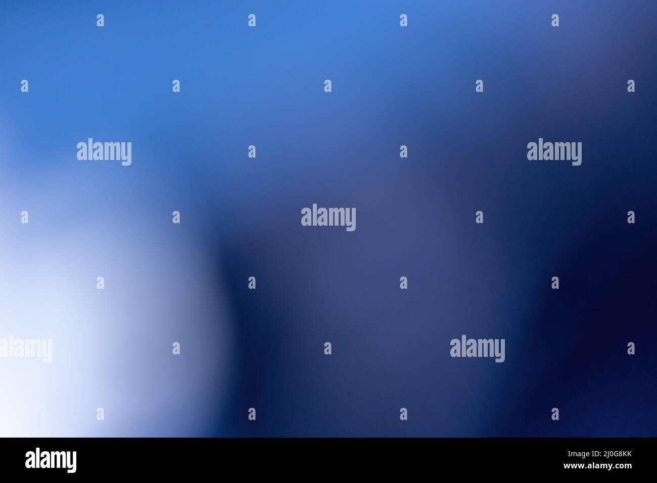 bokeh chiaro e blu scuro e viola sfocato Foto Stock