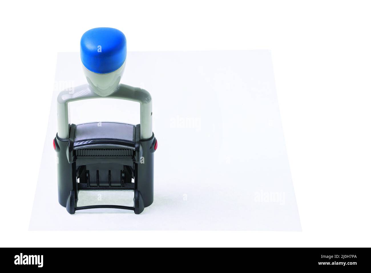 Vista ravvicinata del timbro su sfondo di carta bianca. Foto Stock