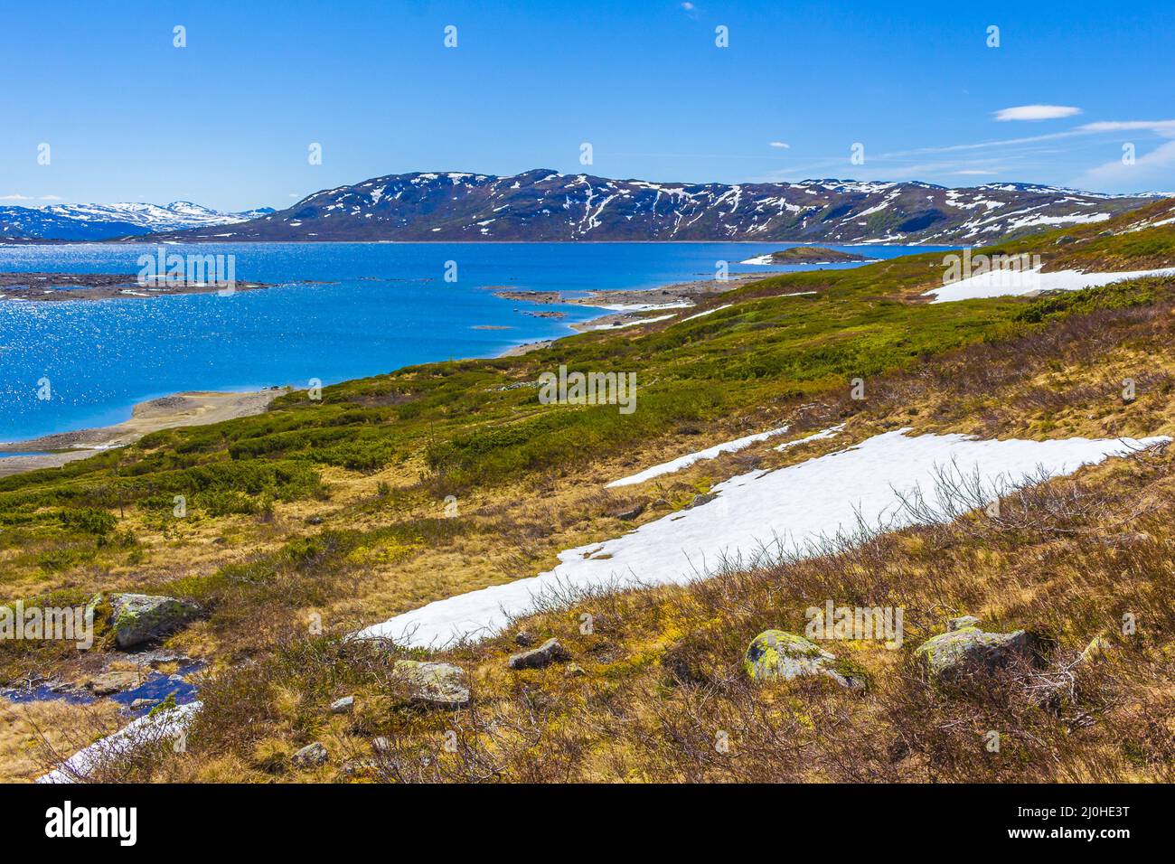 Incredibile lago di Vavatn panorama ruvido paesaggio massi montagne Hemsedal Norvegia. Foto Stock