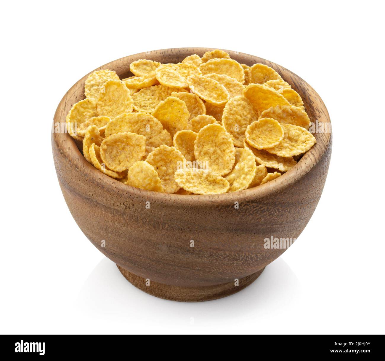 Ciotola di legno di fiocchi di mais isolato su sfondo bianco Foto Stock