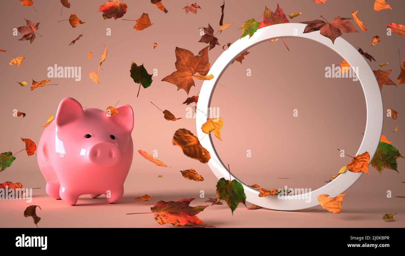 Piggy banca in autunno foglie Foto Stock