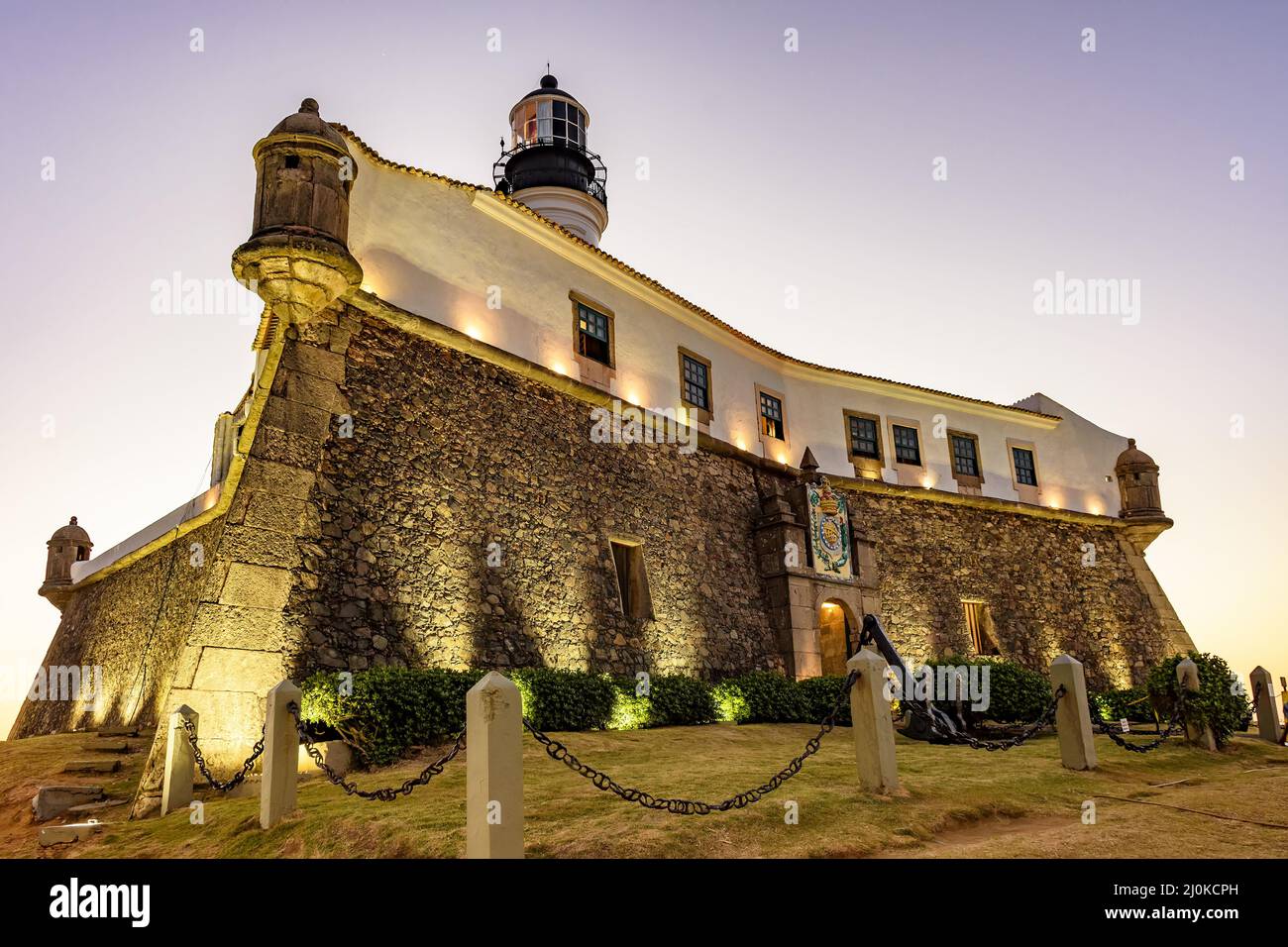 Tramonto al vecchio e storico forte e faro barra Foto Stock