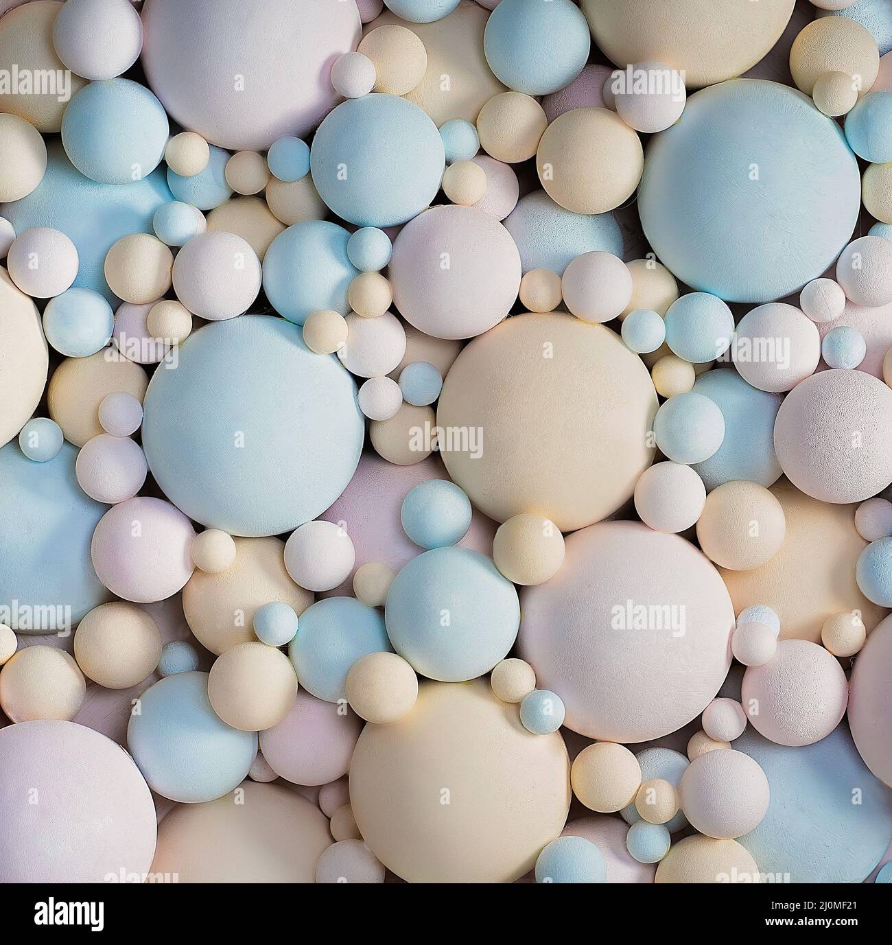 Abstract 3D sfondo con colori pastello Palline Matte. Delicate Blue, Pink, Beige Palline di diverse misure di forma sferica. Testo Foto Stock