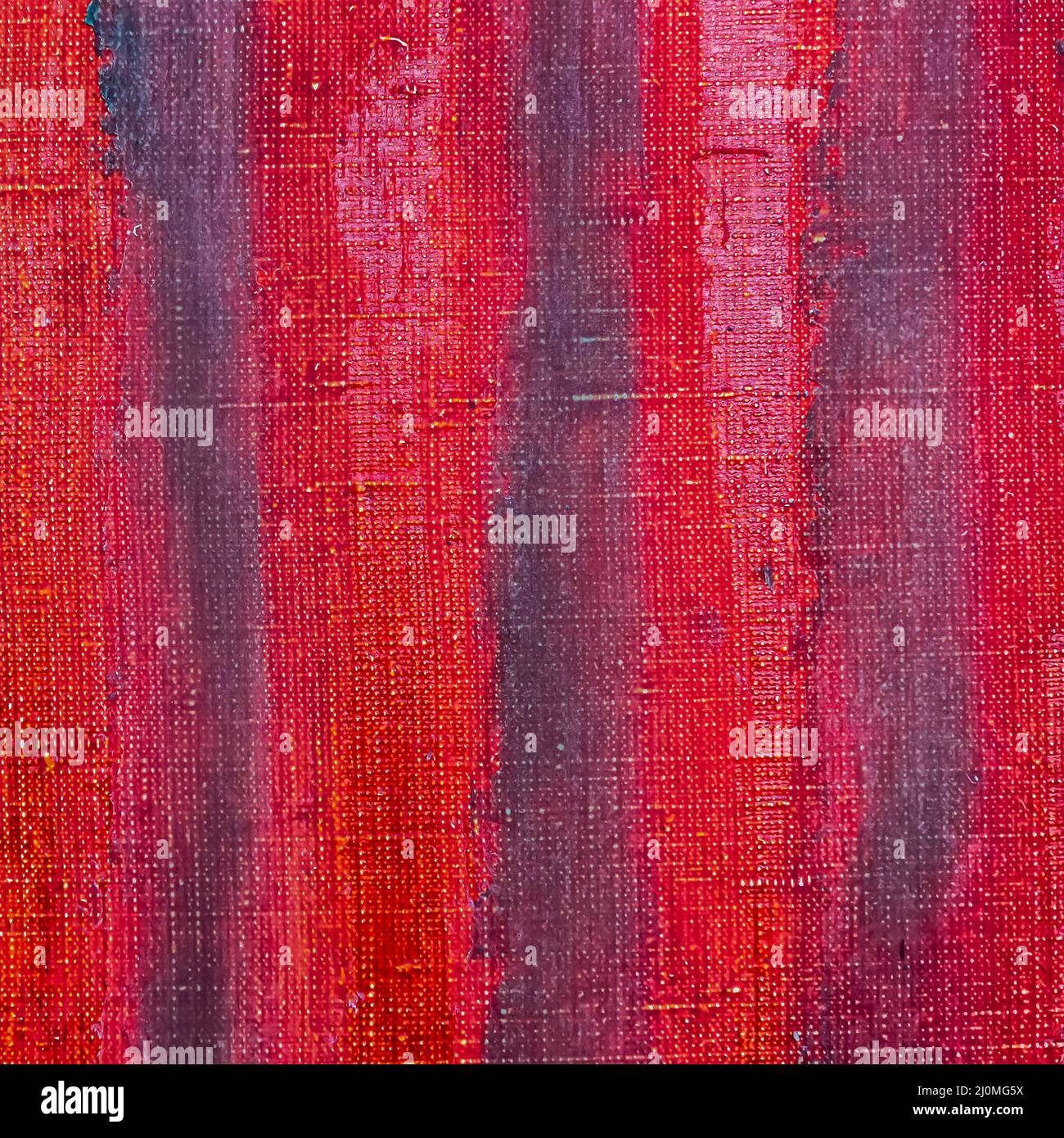 tela acrilica colorata dipinta a mano con pennellate verticali rosse Foto Stock