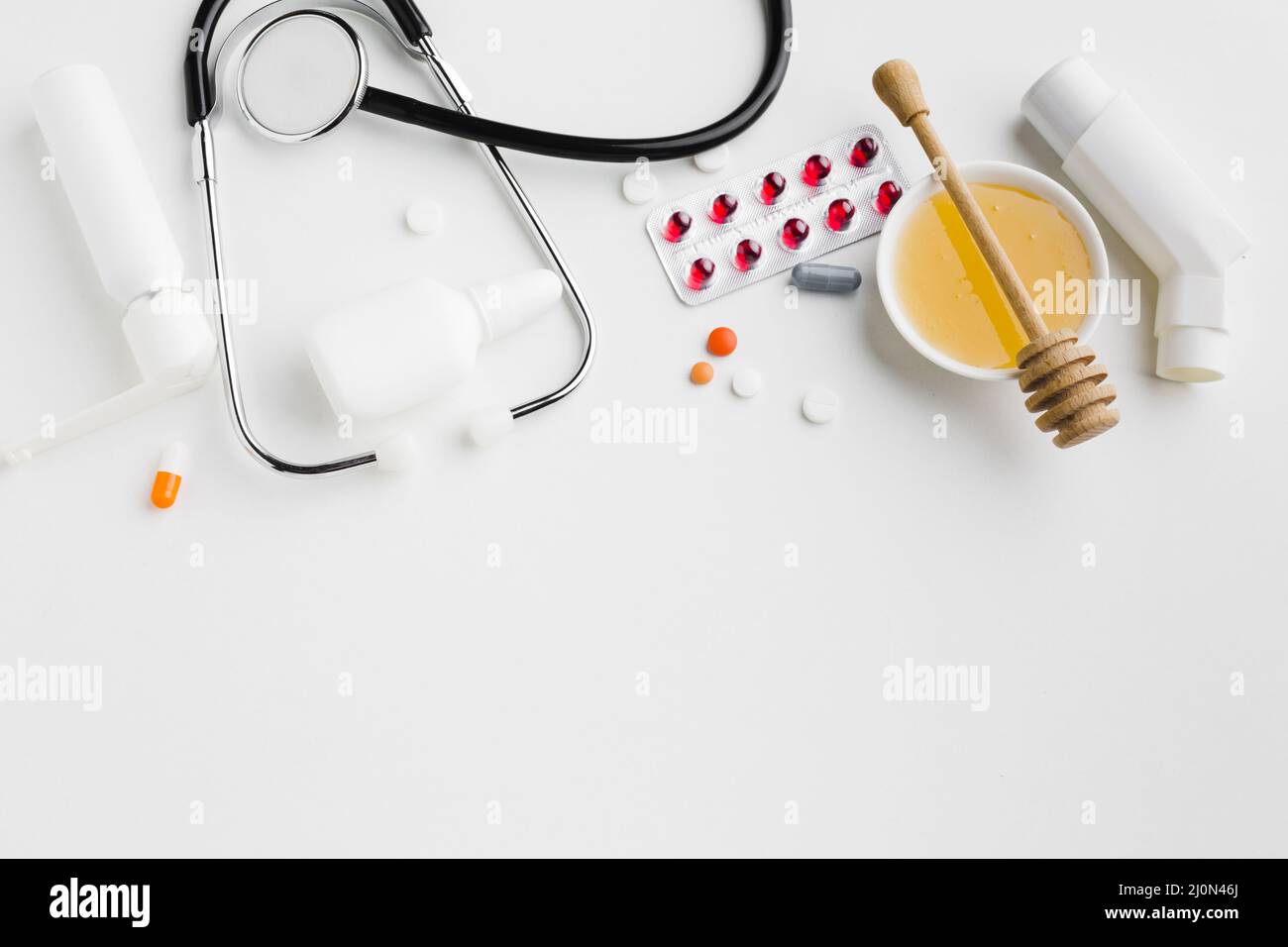Inalatore di asma con miele di trattamento medico Foto Stock