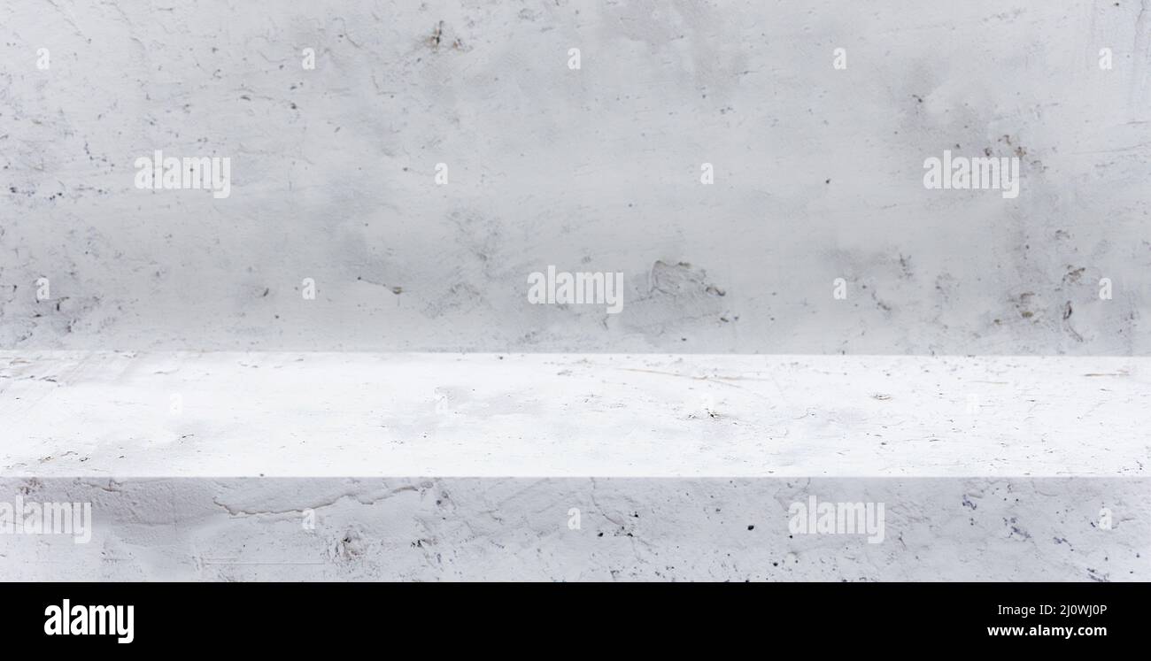 Visualizzazione della tabella delle texture in calcestruzzo grigio chiaro per la dimostrazione del prodotto Foto Stock