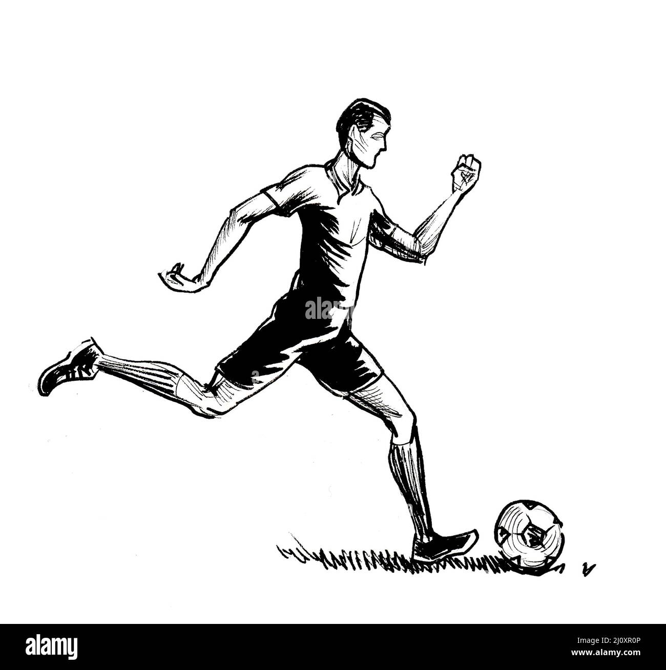 Giocatore di calcio calcia una palla. Disegno in bianco e nero con inchiostro Foto stock - Alamy