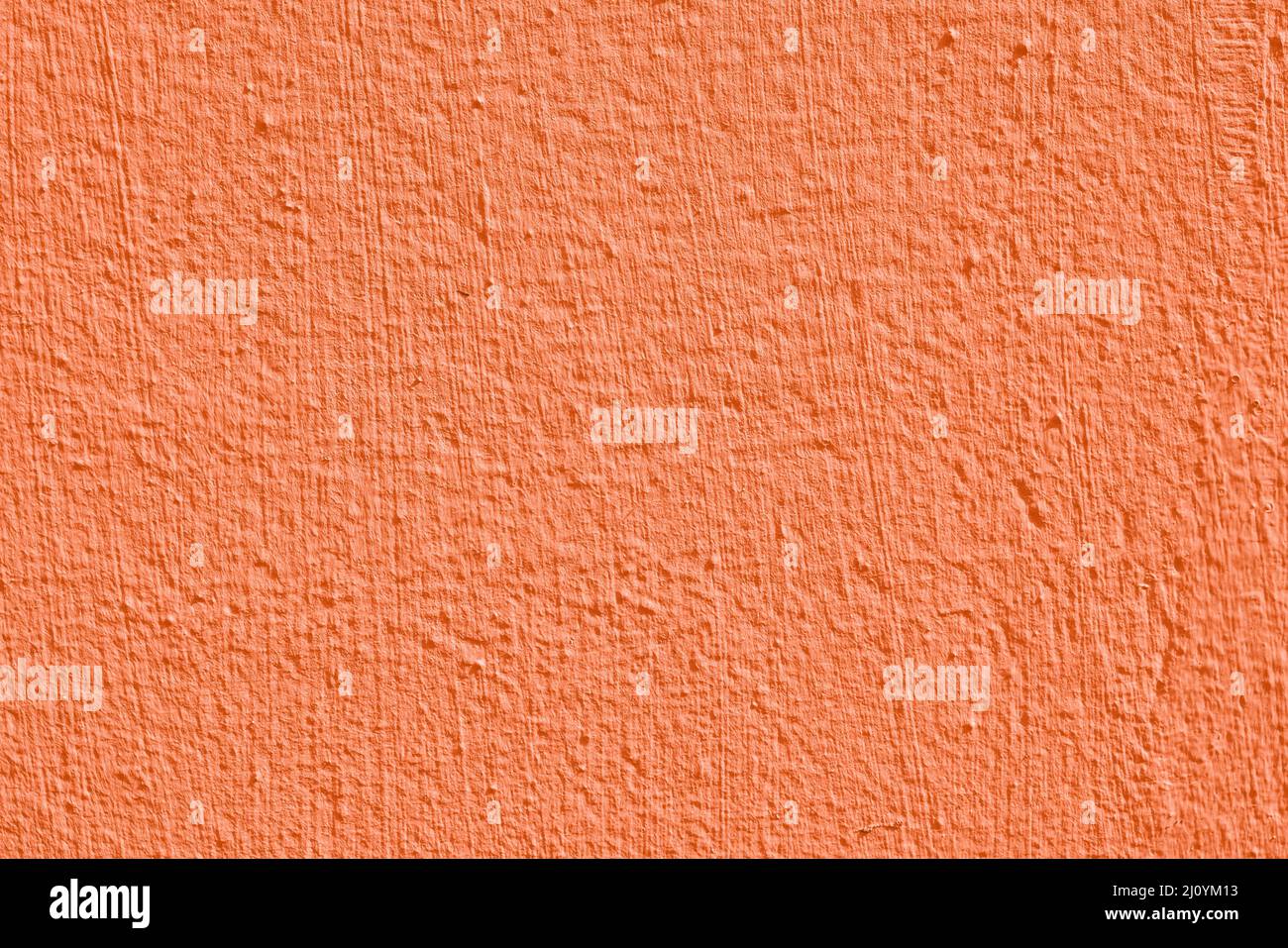 Stucco arancione. Interni di design. Astratta superficie architettonica. Foto Stock