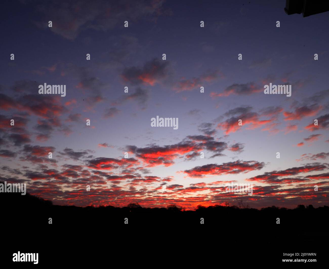 Cielo rosso di notte, St Austell, Cornovaglia. Foto Stock