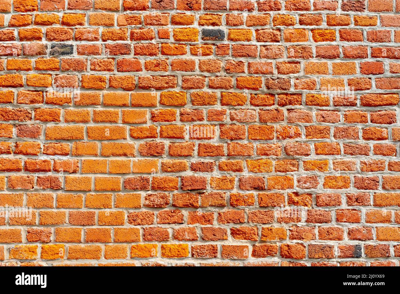 Lo sfondo della vecchia parete di mattoni rossi per interni di design Foto Stock