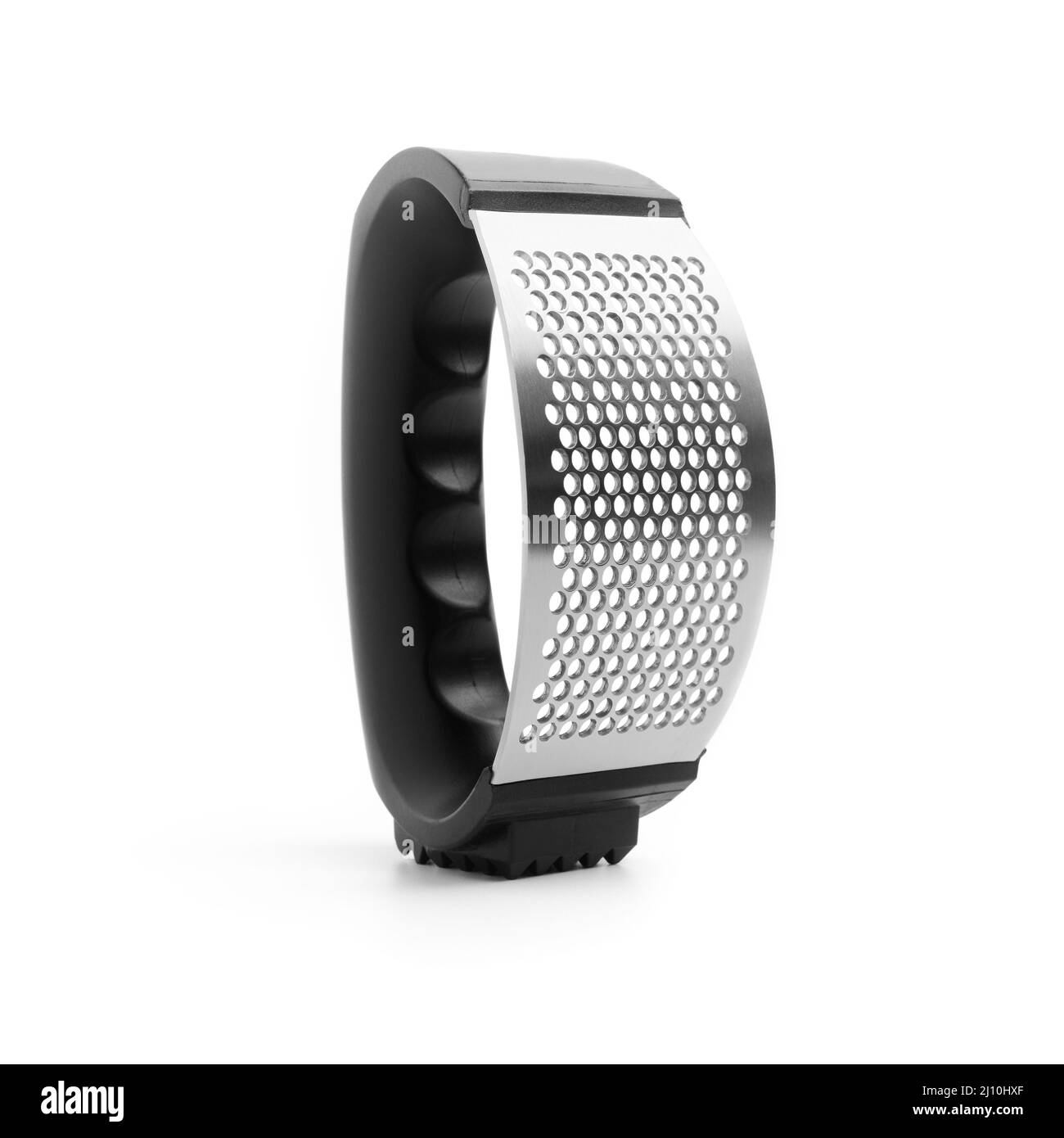 Moderno pressa manuale per aglio in acciaio da primo piano su sfondo bianco Foto Stock