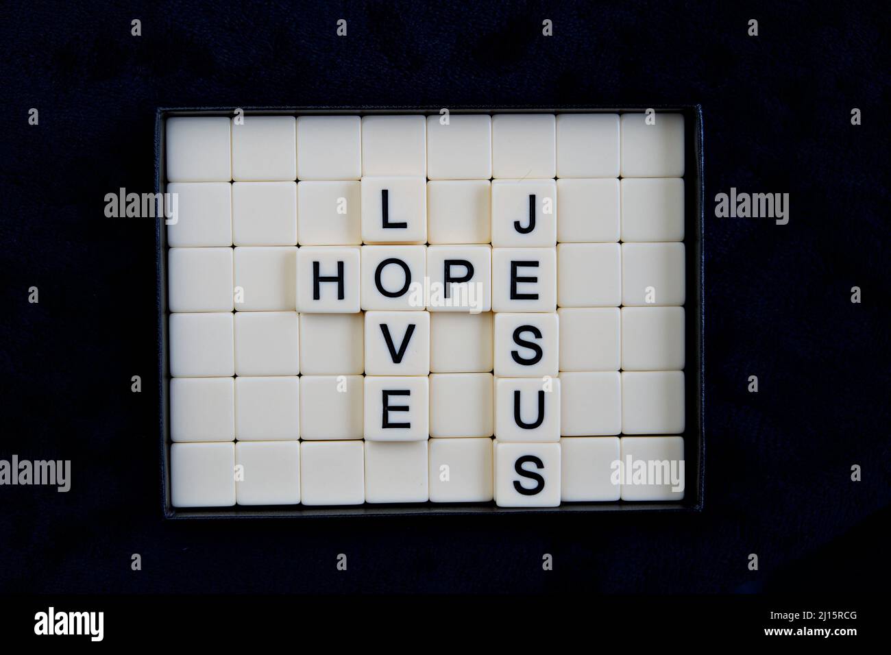 Amore, speranza, Gesù: Parole costituite da combinazioni di lettere Foto Stock