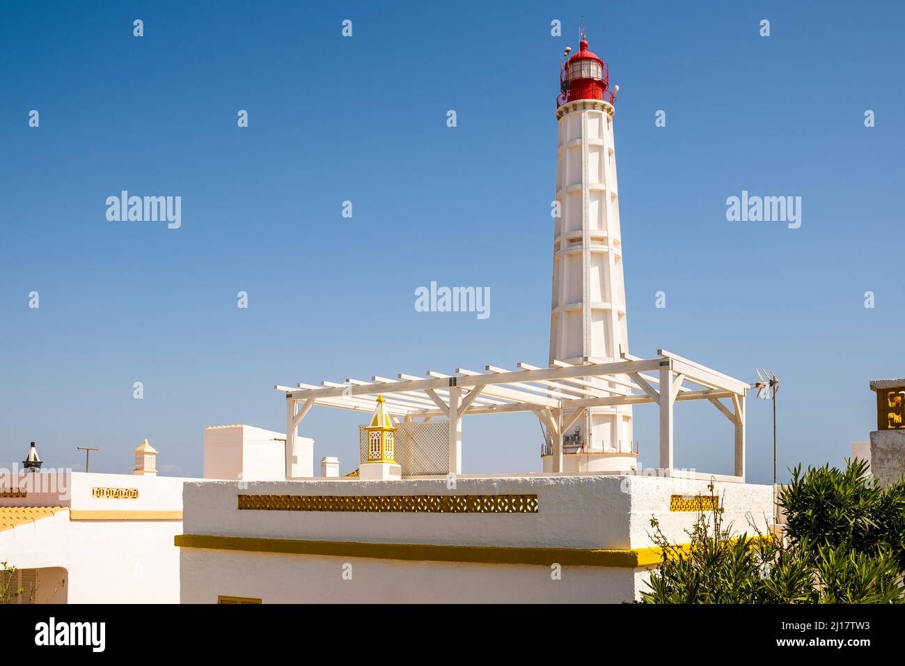 Faro a Farol Island, Disctrict Faro, Algarve, Portogallo meridionale Foto Stock