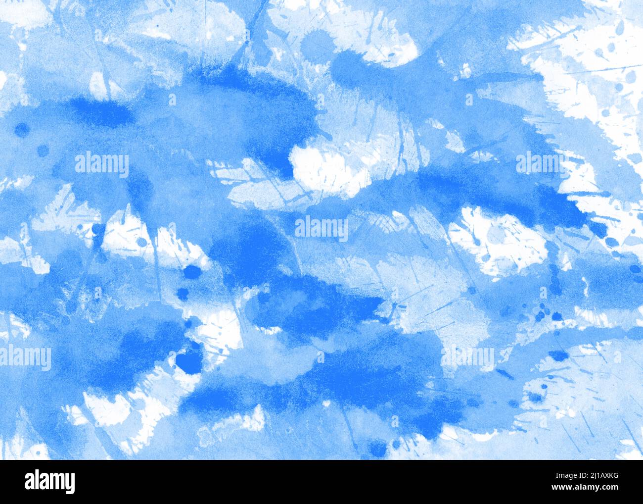 Spruzzi di colore sul foglio Foto Stock