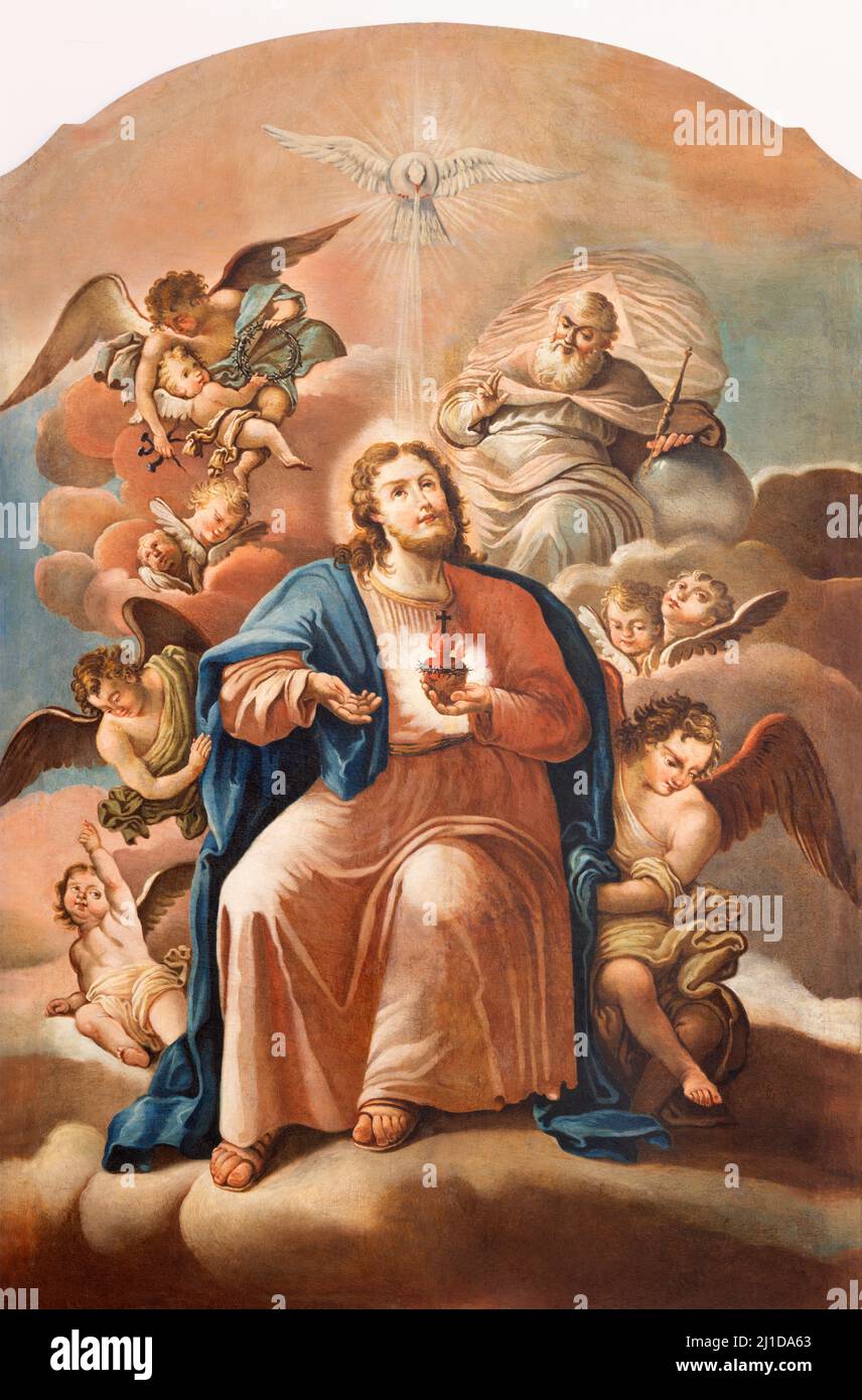 MONOPOLI, ITALIA - 6 MARZO 2022: Il dipinto del cuore di Gesù tra gli angeli nella chiesa Chiesa di Santa Theresia di ignoto artista del 17.cent. Foto Stock