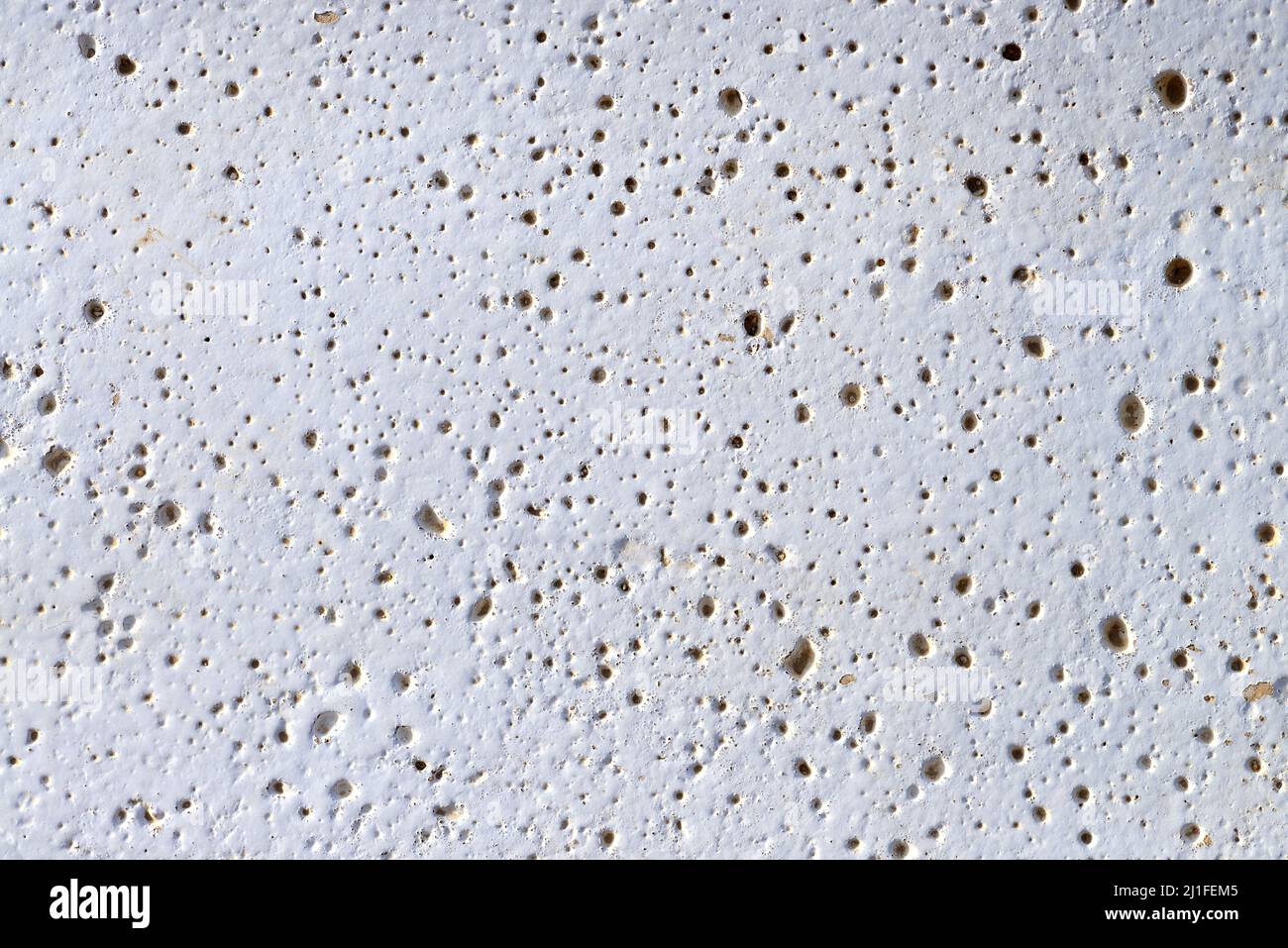 all'esterno della piscina dell'hotel, il bordo è dipinto di bianco e in pietra Foto Stock