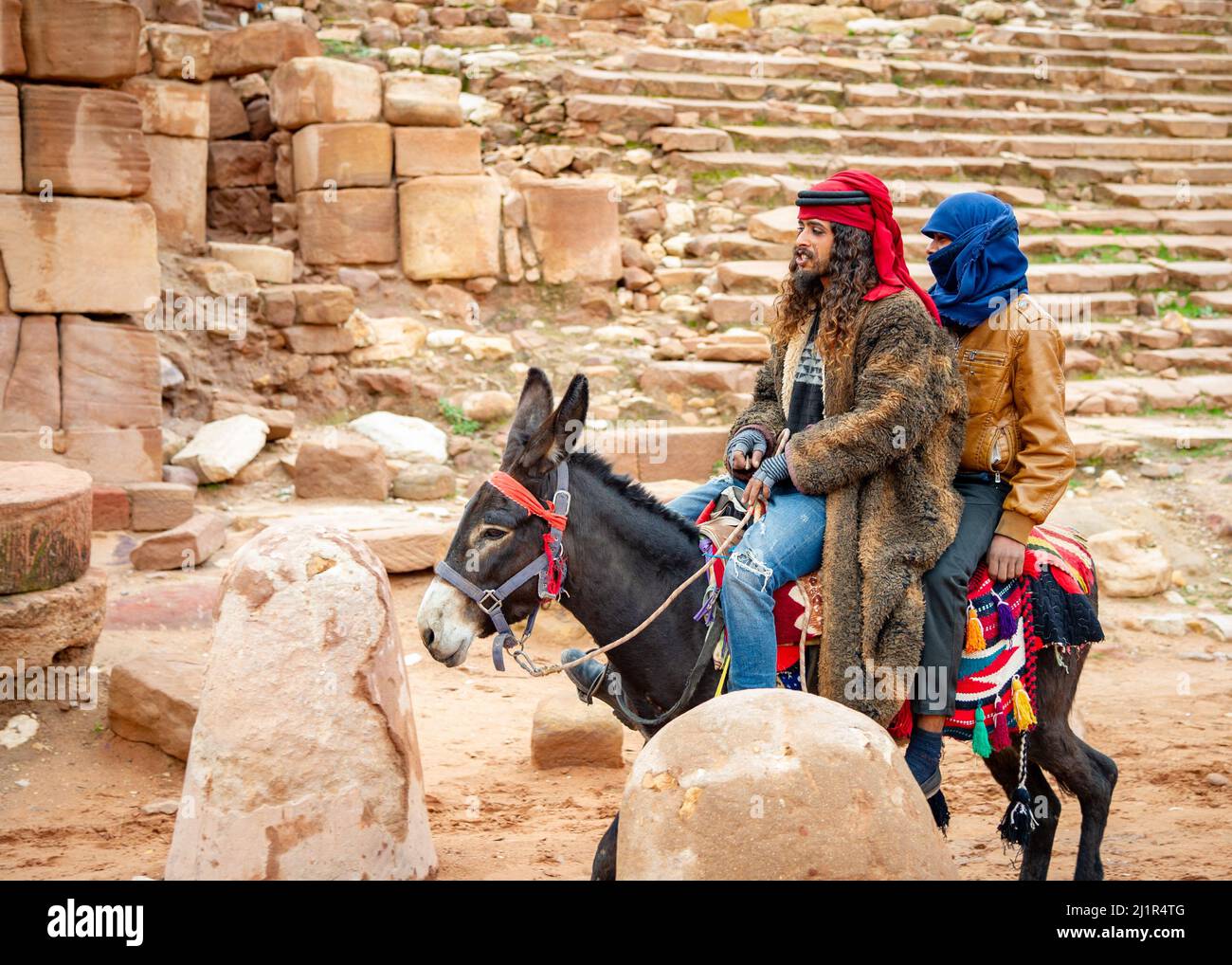 Bedouin a Petra Jordan offre ai turisti i suoi servizi di equitazione 20 febbraio 2020 Foto Stock