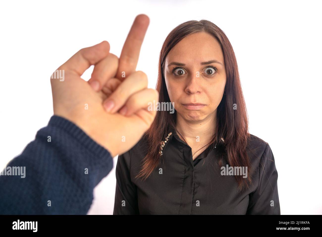 Woman shows middle finger immagini e fotografie stock ad alta