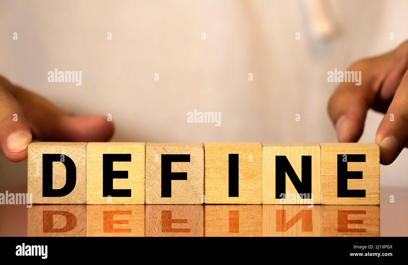 DEFINIRE la parola fatta con i blocchi di costruzione. Concetto Foto Stock