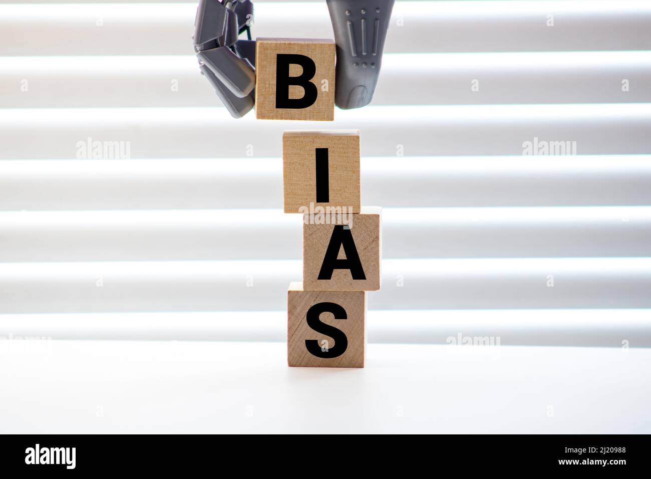 Bias - parola da blocchi di legno con lettere, opinioni personali pregiudizio bias concetto, lettere casuali intorno, sfondo bianco Foto Stock