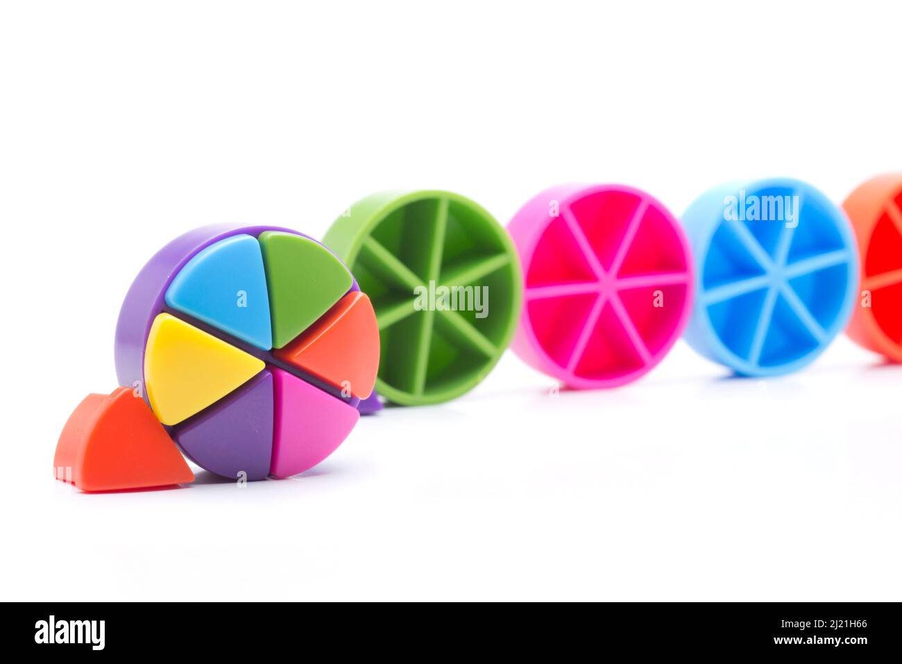 Triangoli colorati, disposti in cerchio Foto Stock