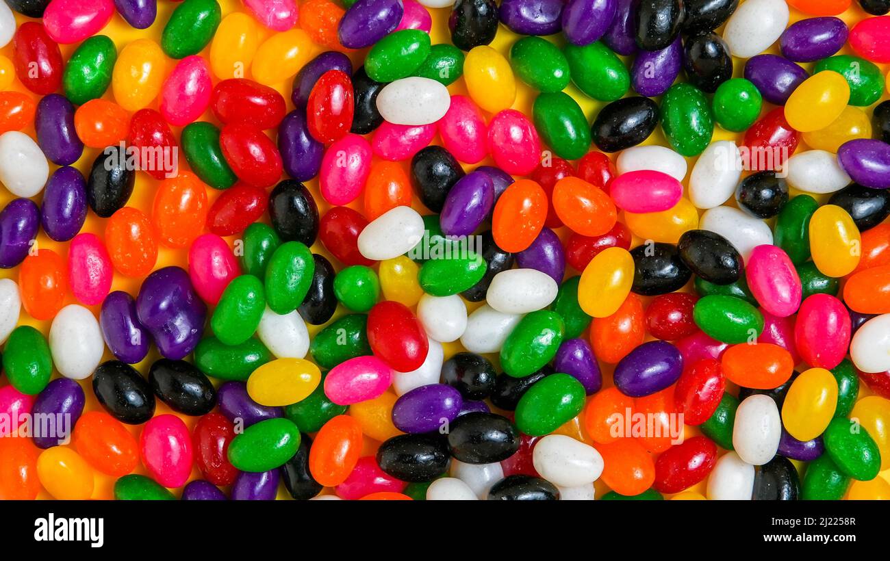 Colorati fagioli di gelatina caramelle sfondo da vicino Foto Stock