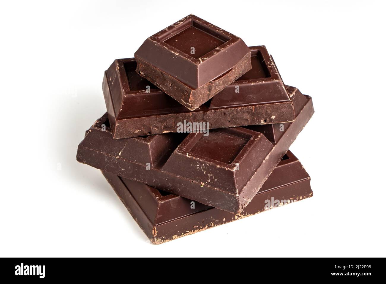 Pezzi rotti di cioccolato fondente da vicino. Foto Stock