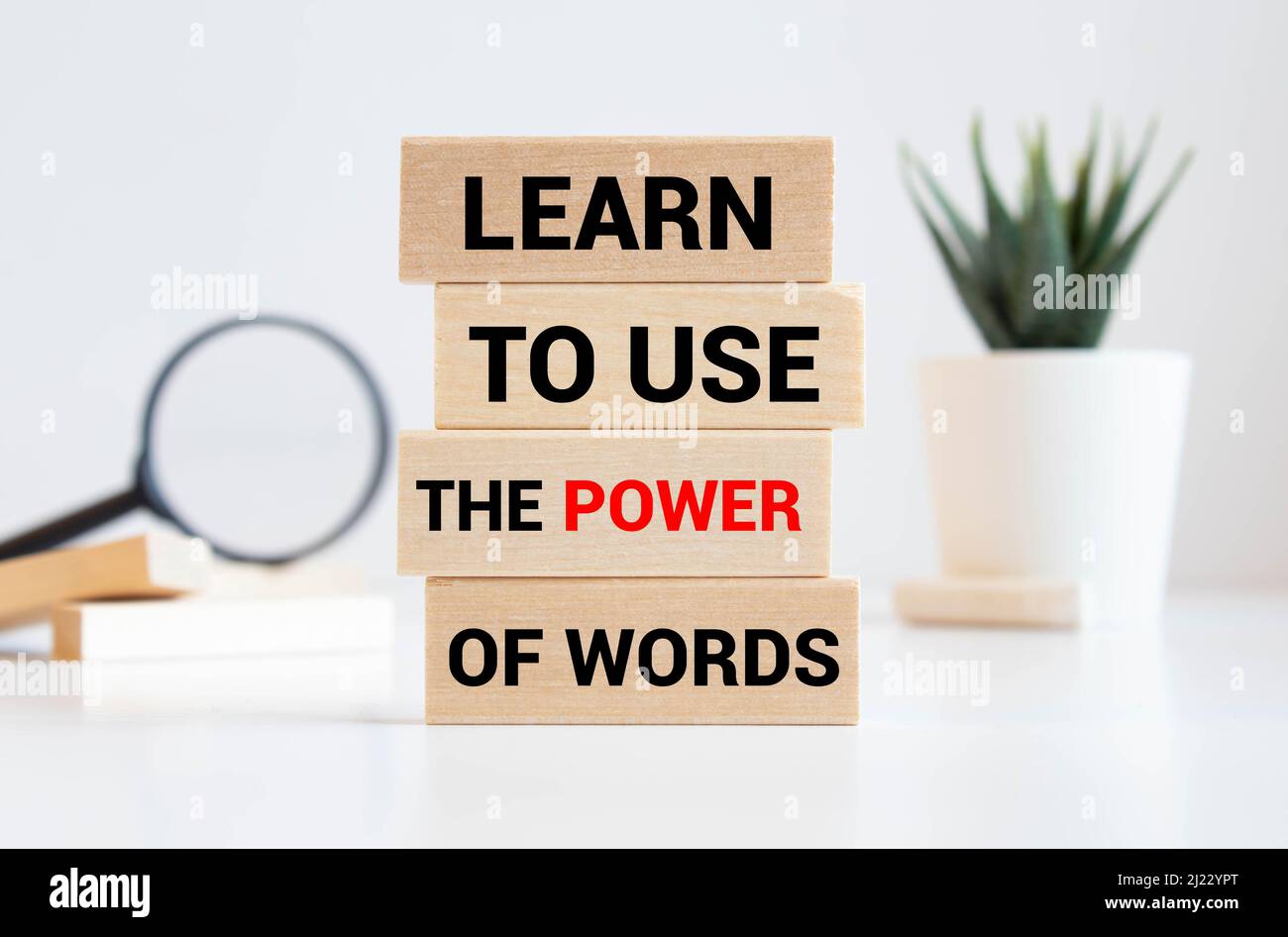Imparare ad usare il potere delle parole sul blocco di legno Foto Stock