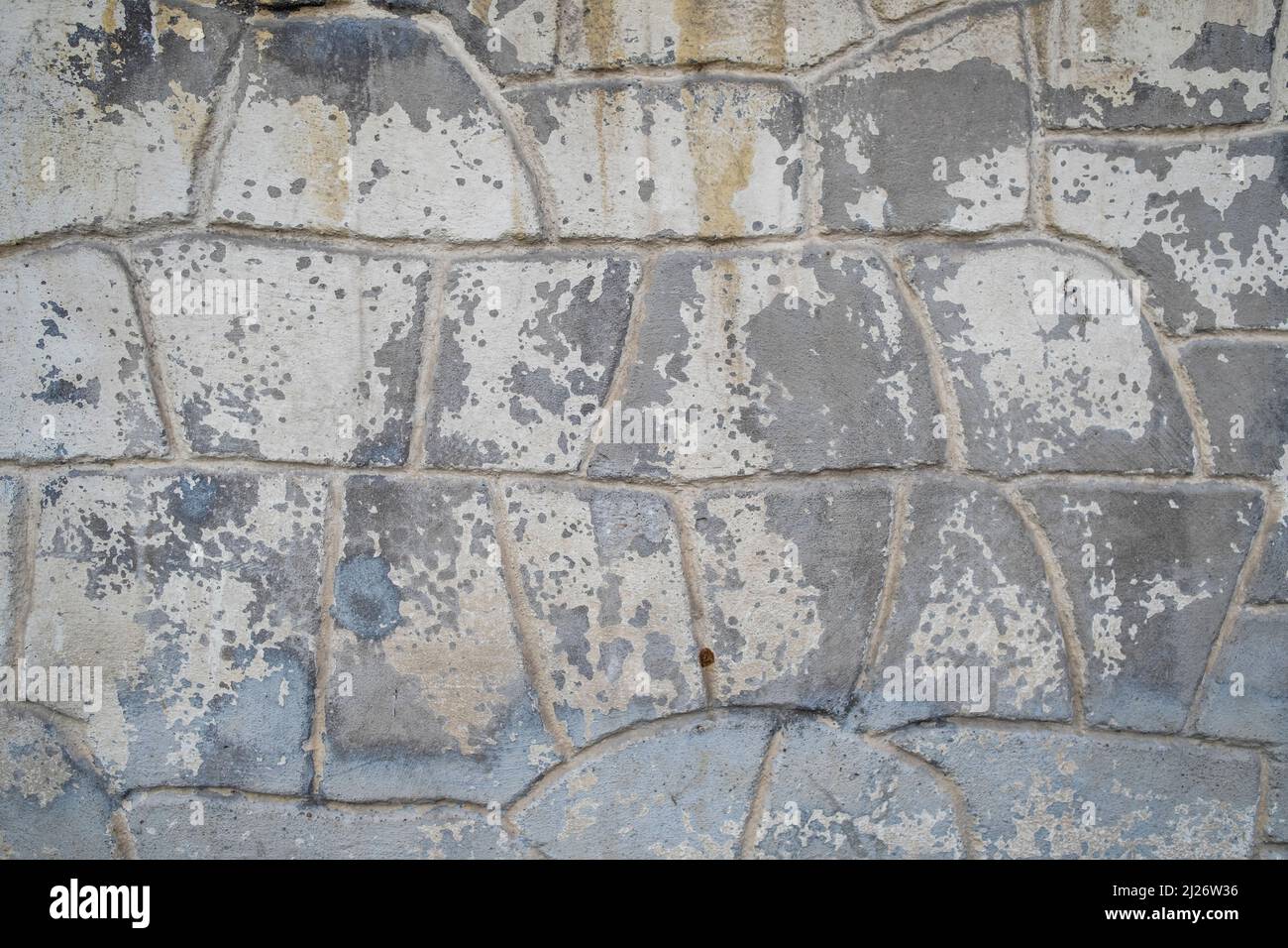 Texture map. Pietra-osserva parete di cemento con vernice peeling. Spazio copia. Sfondo. Foto Stock