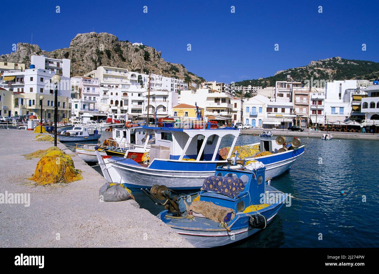 Pigadia, fioritura della pesca nel porto, isola di Karpathos, Dodecaneso, Grecia, Europa Foto Stock