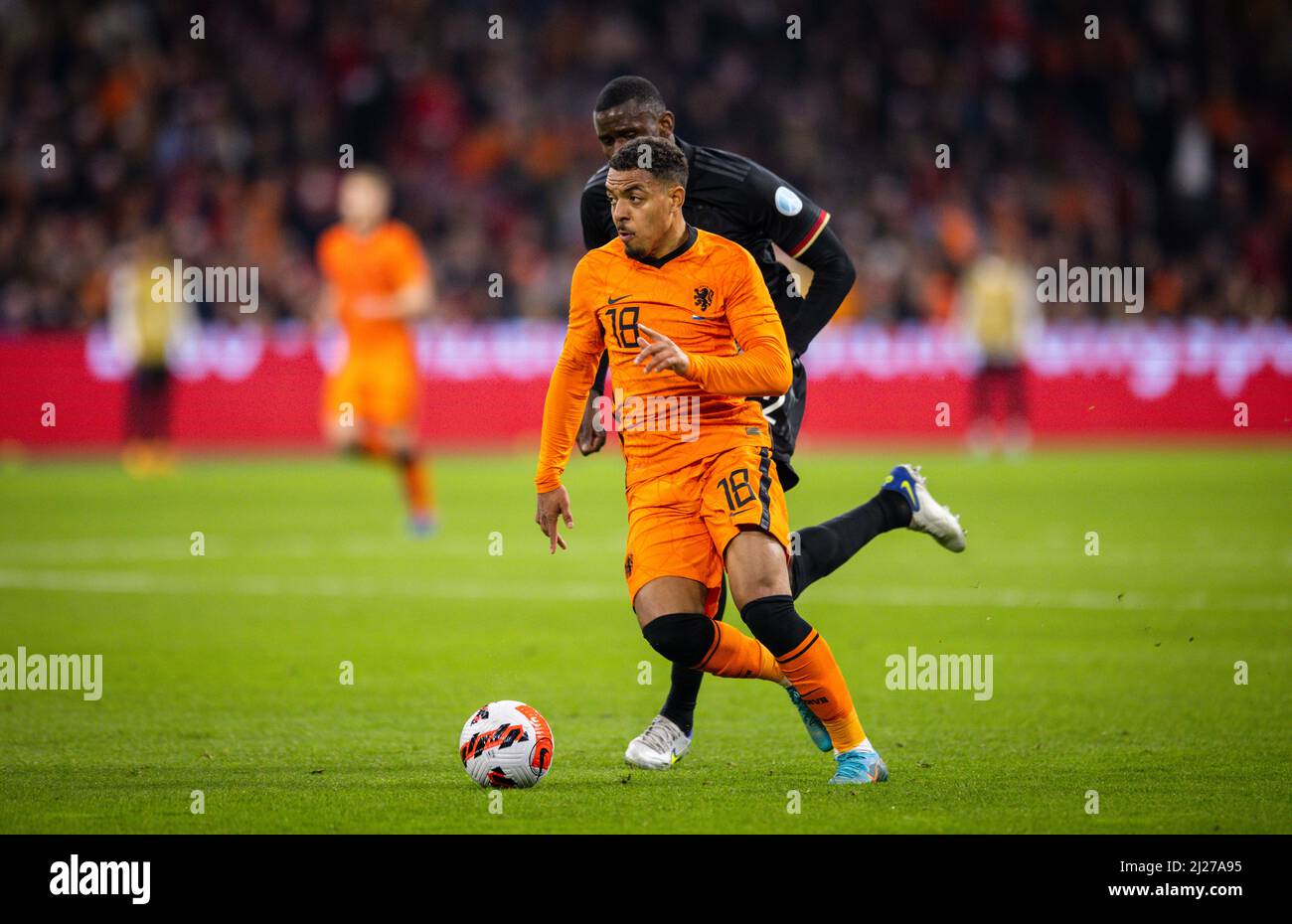 Donyell Malen (Niederlande), Antonio Rüdiger (Deutschland) Niederlande - Deutschland Paesi Bassi - Germania 29.03.2022, Fussball; DFB, Saison 2021/22 Foto Stock