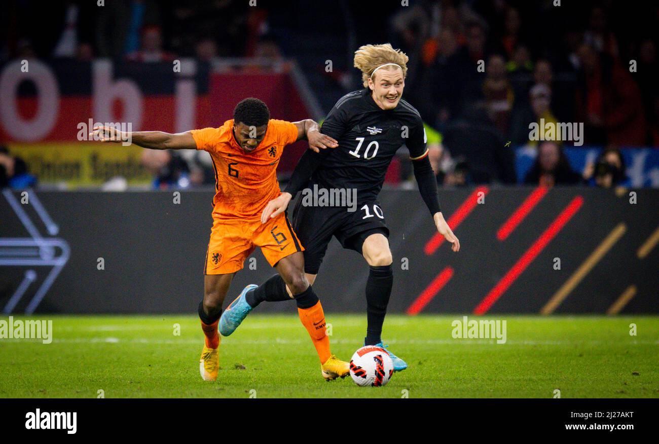 Tirell Malacia (Niederlande), Julian Brandt (Deutschland) Niederlande - Deutschland Olanda - Germania 29.03.2022, Fussball; DFB, Saison 2021/22 Foto Stock