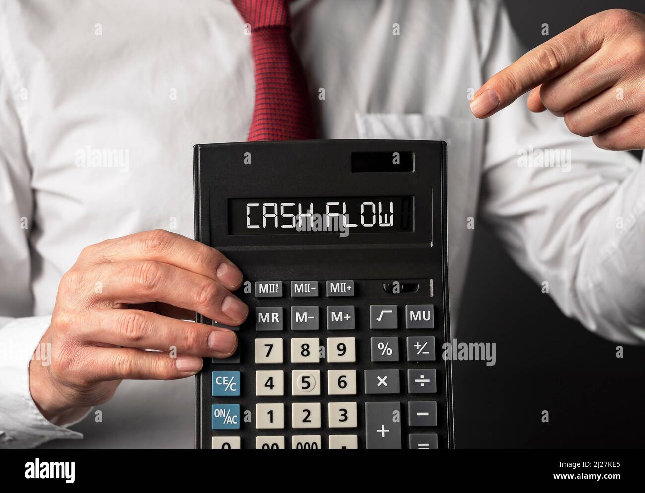 Parola di flusso di cassa sulla calcolatrice per finanza di affari. Foto di alta qualità Foto Stock