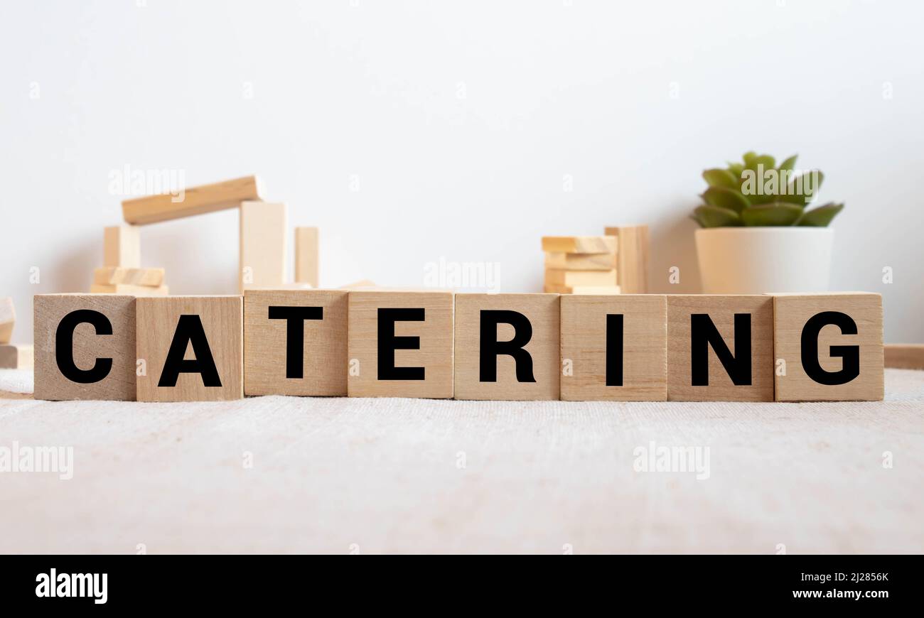 CONCETTO DI CATERING word on block, concetto di business Foto Stock