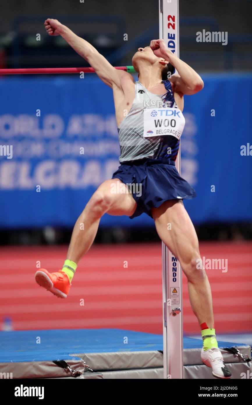 Sang-Hyeok Woo (KOR) vince il salto in alto a 7-8 (2,34m) durante i Campionati mondiali di atletica indoor, domenica 20 marzo 2022, a Belgrado, Serbia. (Ji Foto Stock